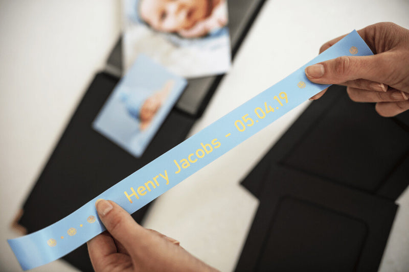 Brother TZE-RL54 etiketbånd Gold on blue